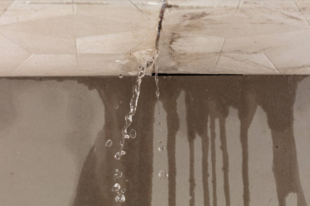 Professional Flood Damage Cleanup technician working in Smithville, TX